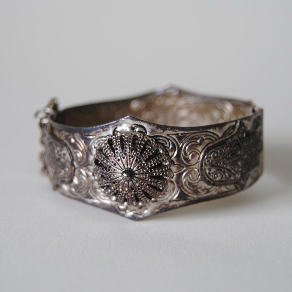 Elegant Silver Bracelet with Intricate Design